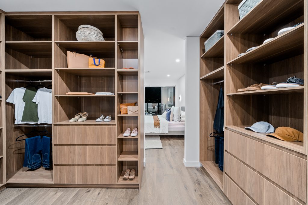 Image shows a custom made walk-in wardrobe by Benelong Projects, Sydney based home builders and designers