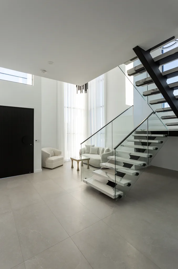 Image shows the staircase in a home built by Sydney home builders Benelong Projects