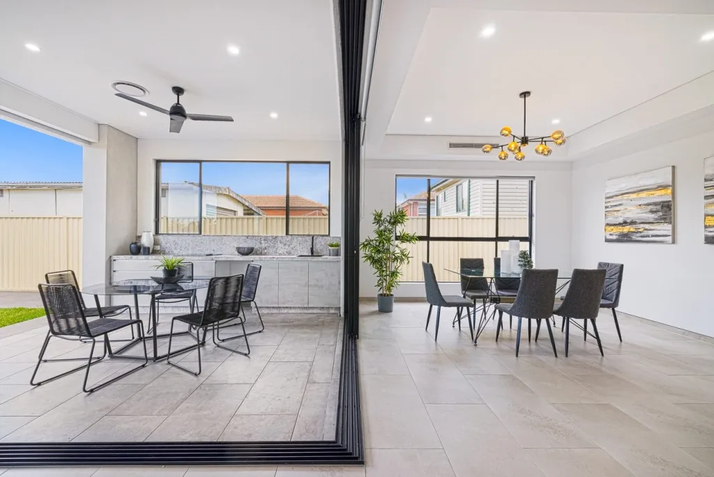 image shows a home with seamless flow between indoors and outdoor areas