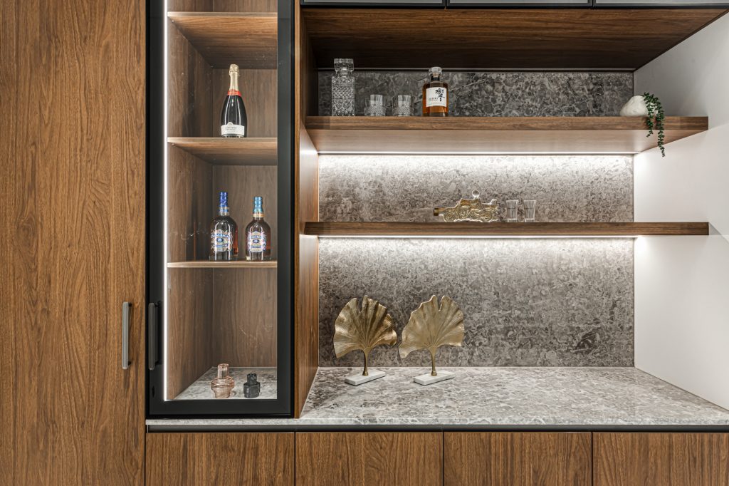 Image shows boutique shelving and storage constructed of wood, granite, and glass. Designed and built by Benelong Projects, Sydney