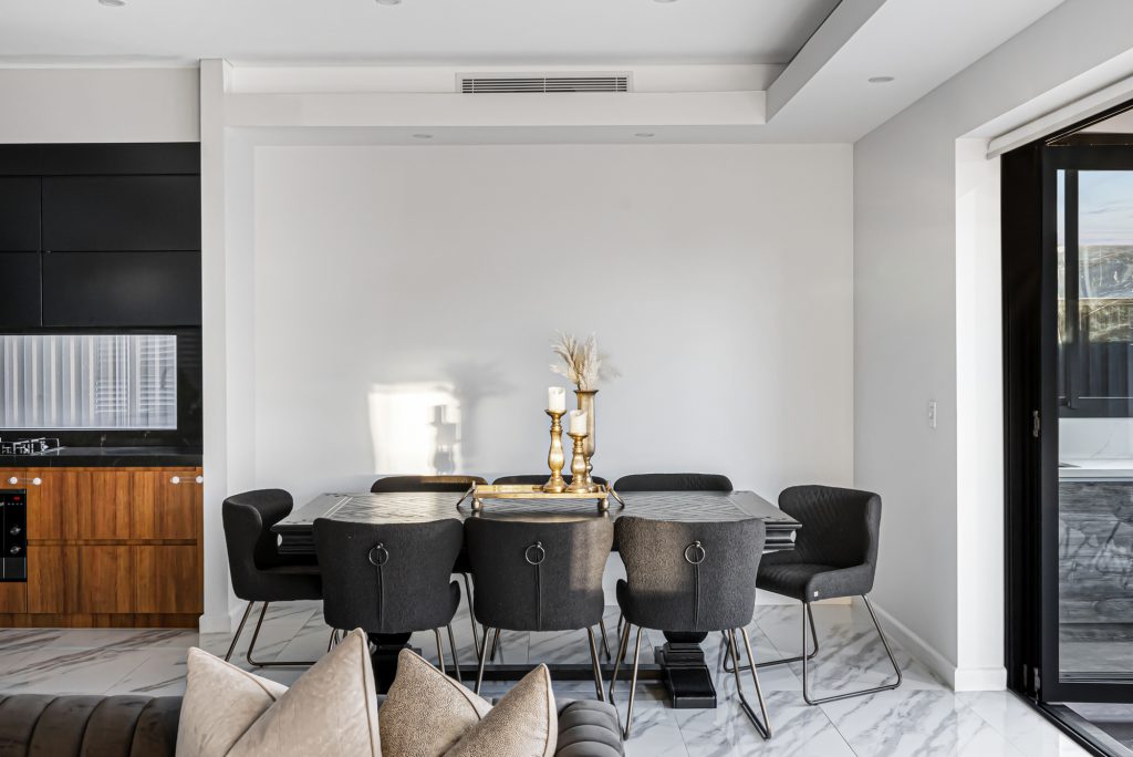 Image shows Kitchen and Dining Area created using modern design principals by Benelong Projects