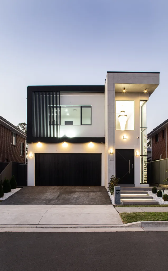 Image shows the exterior of modern and stylish two story home built by Sydney home builders Benelong Projects